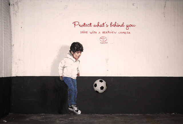 consider-ernest zacharevic-protect-whats-behind-you-7